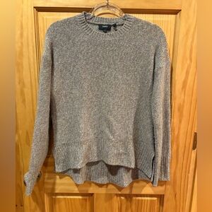 Theory knit crewneck sweater in various shades of brown and beige.